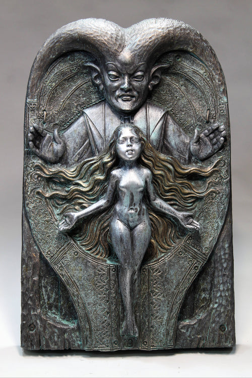 Bronze-like sculpture of a figure with ram's head and a woman below on a gray background