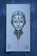 A square art print featuring a detailed illustration of a metallic humanoid robot face with glowing blue eyes, centered on textured blue paper. The print includes red Japanese calligraphy and two red artist stamps at the bottom.