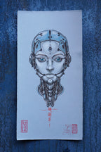 A square art print featuring a detailed illustration of a metallic humanoid robot face with glowing blue eyes, centered on textured blue paper. The print includes red Japanese calligraphy and two red artist stamps at the bottom.