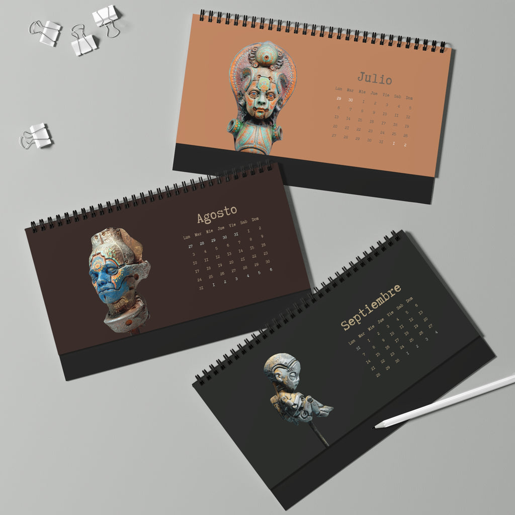 Three spiral-bound calendars with artistic head designs on a gray background