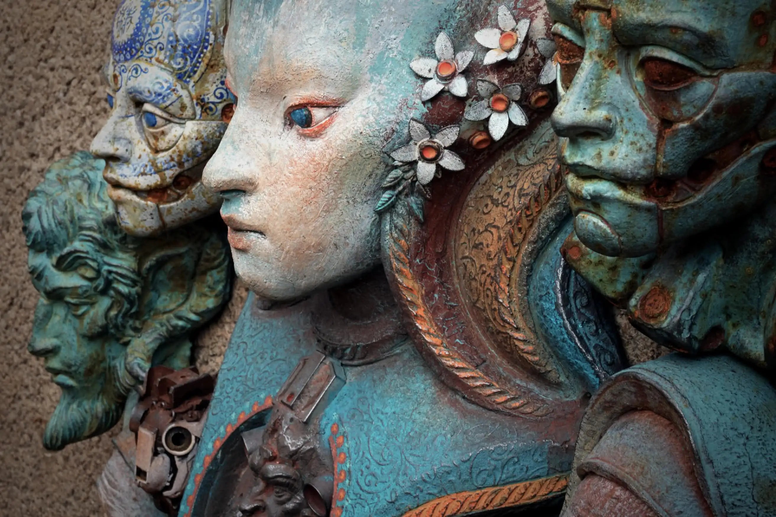 Close-up of a decorative sculpture with intricate details and a neutral background